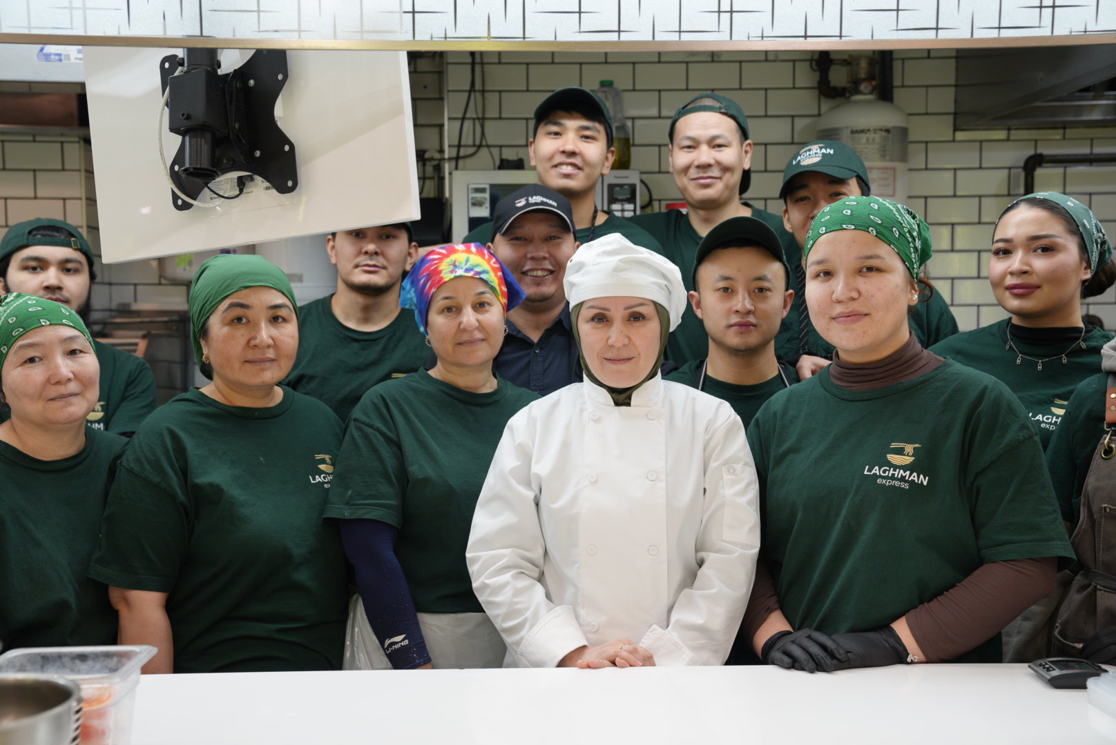 Gulnoza Jurayeva with the Laghman Express kitchen team